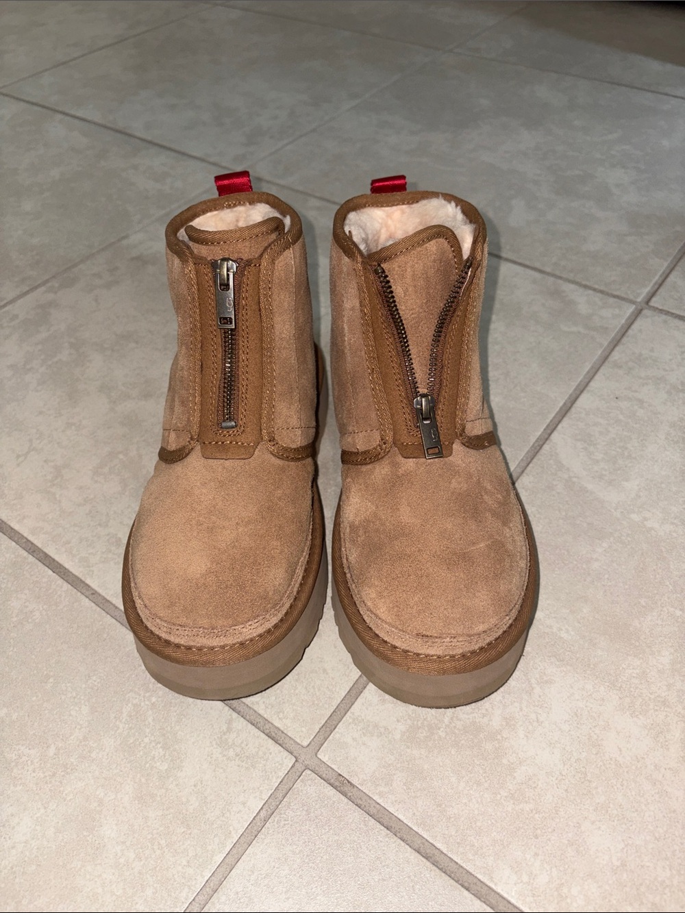 UGG platform zip booties
